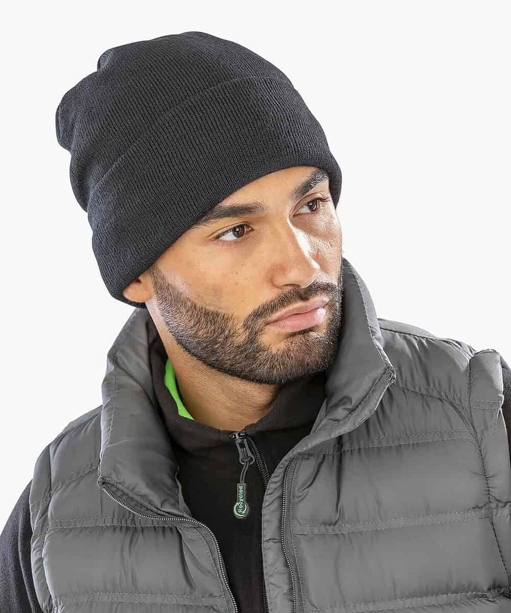 Man wearing a black lightweight Thinsulate beanie for winter warmth.