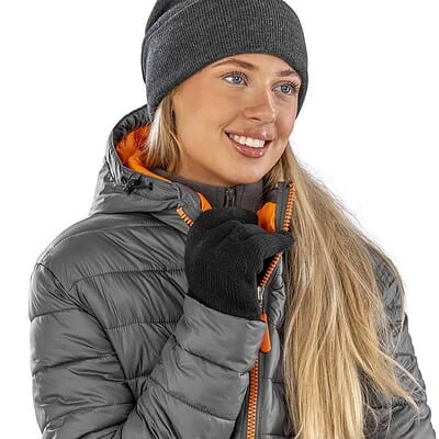 Embroidered winter beanie with pom pom, personalised with your logo for warmth and style.