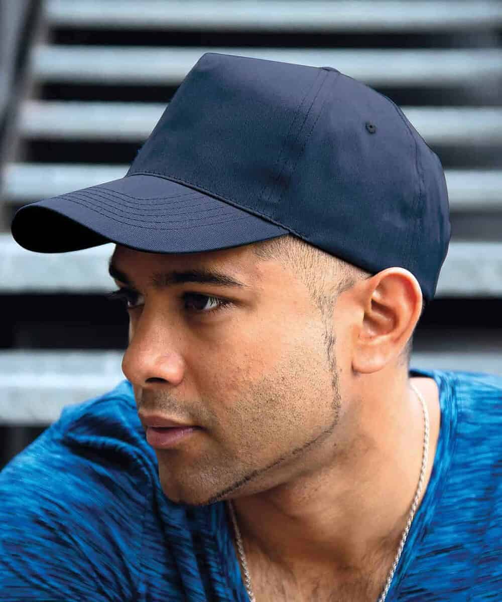 Embroidered 5-panel cap with personalised logo, perfect for workwear or casual wear.