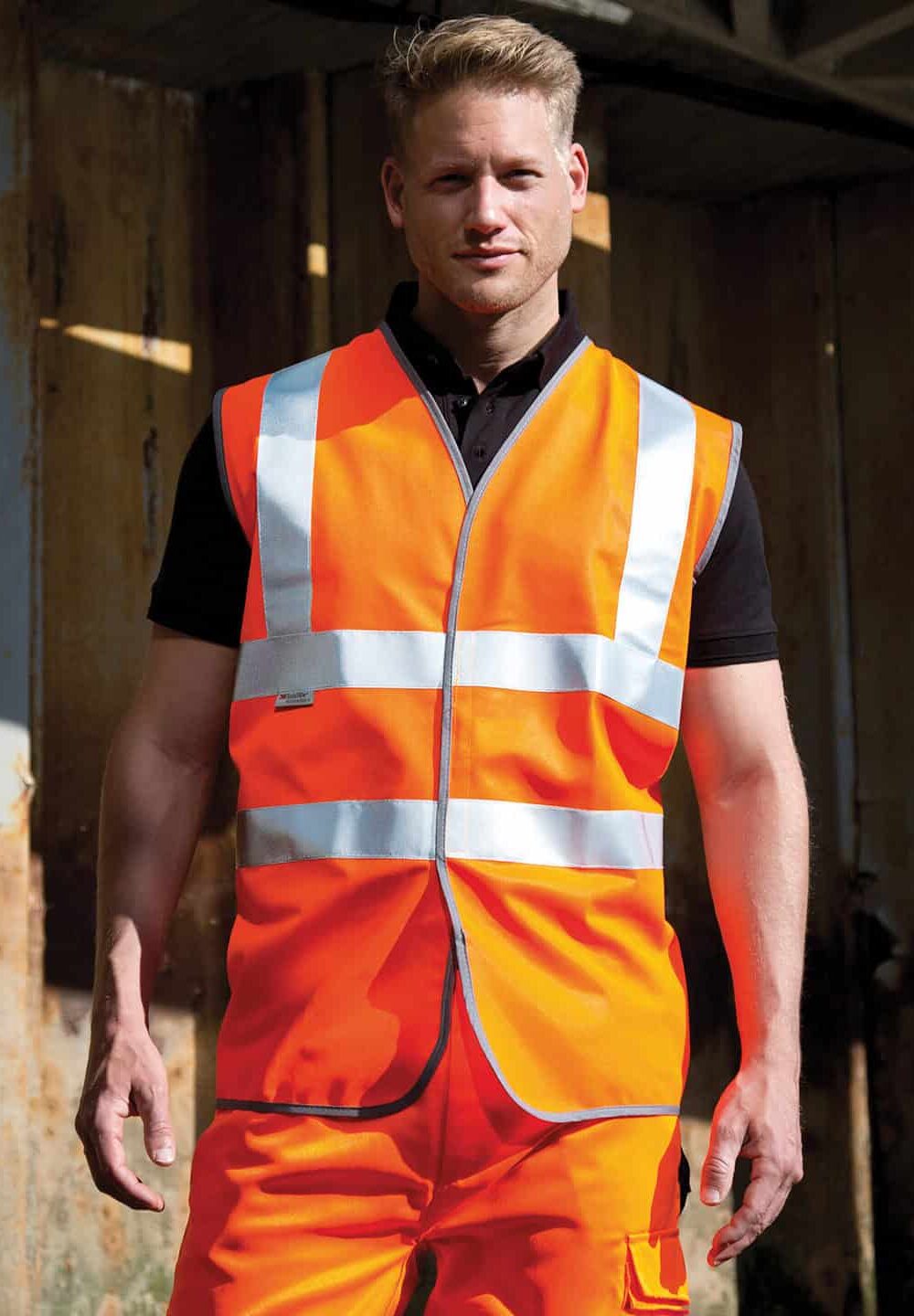High visibility orange and silver reflective safety vest with embroidery options for workwear.