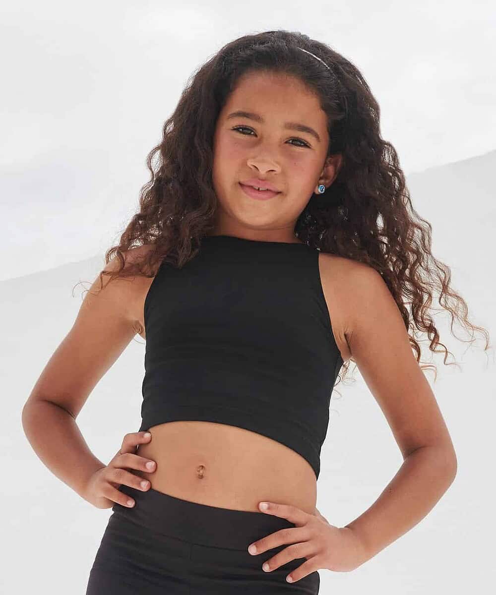 Child wearing a black cropped top with embroidered logo for branding.