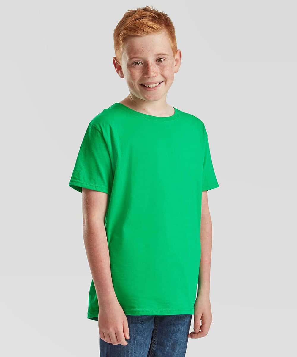 Child wearing a bright green Kids Iconic 150 T-shirt, smiling.