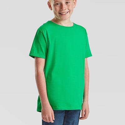Child wearing a bright green Kids Iconic 150 T-shirt, smiling.