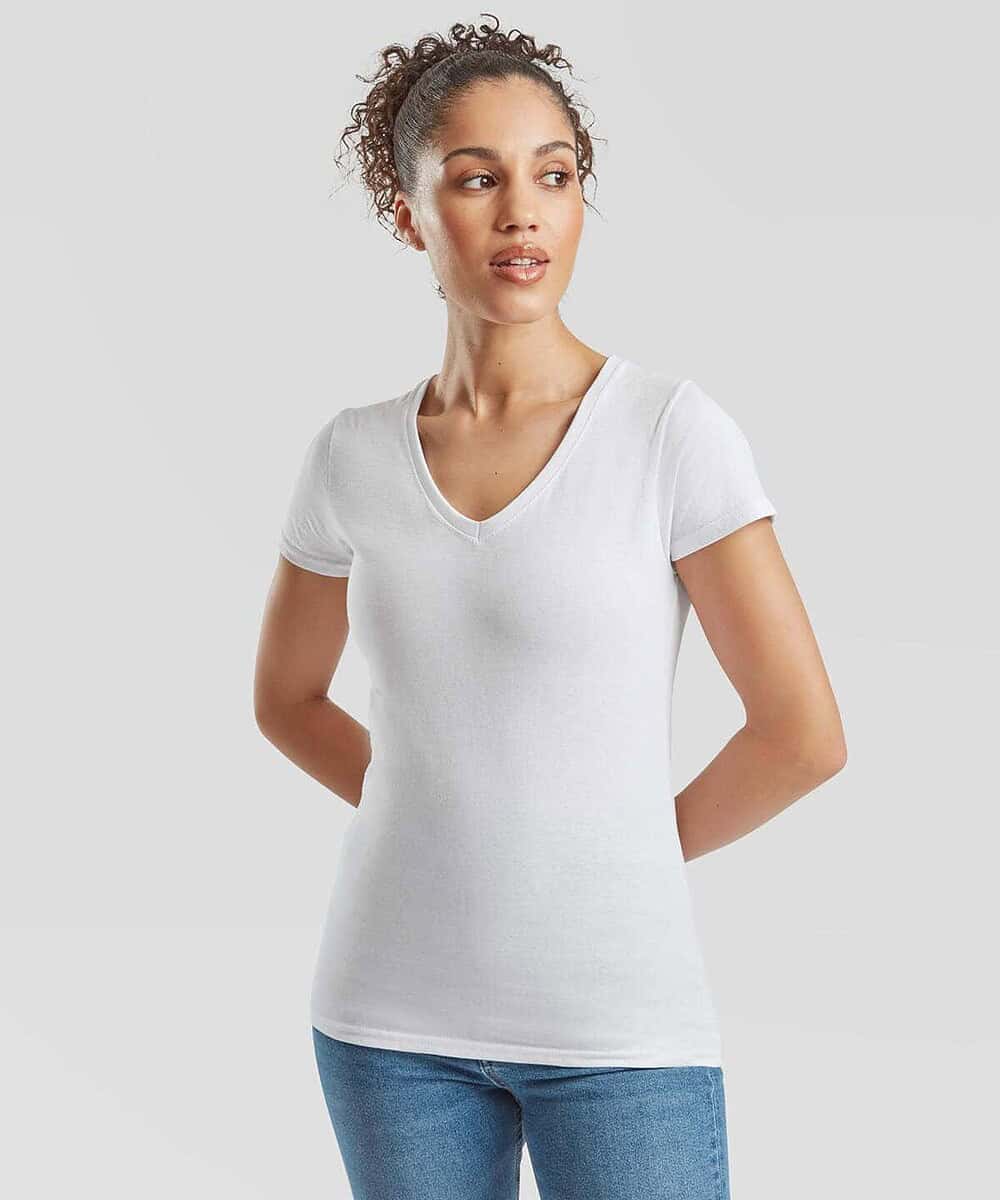 Woman wearing a white V-neck T-shirt, casual and comfortable fit.