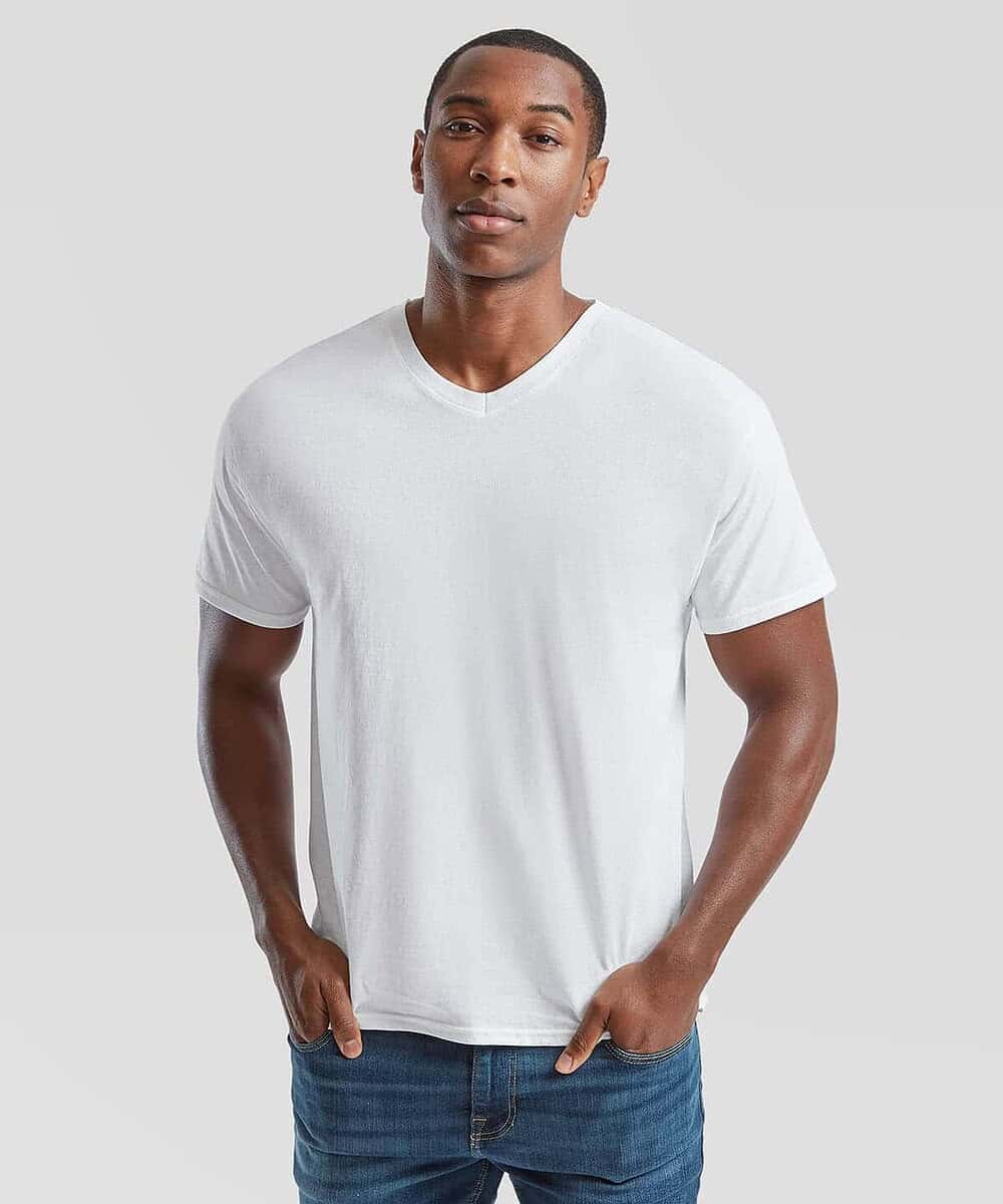 Man wearing a plain white V-neck T-shirt, casual style.