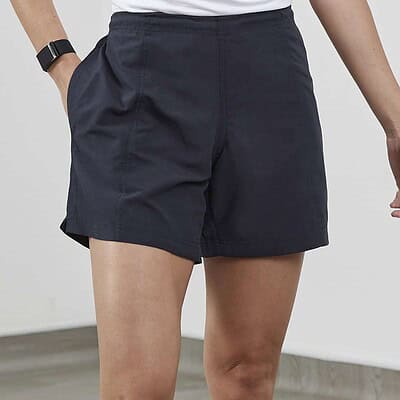 Unisex embroidered workwear shorts with logo branding.