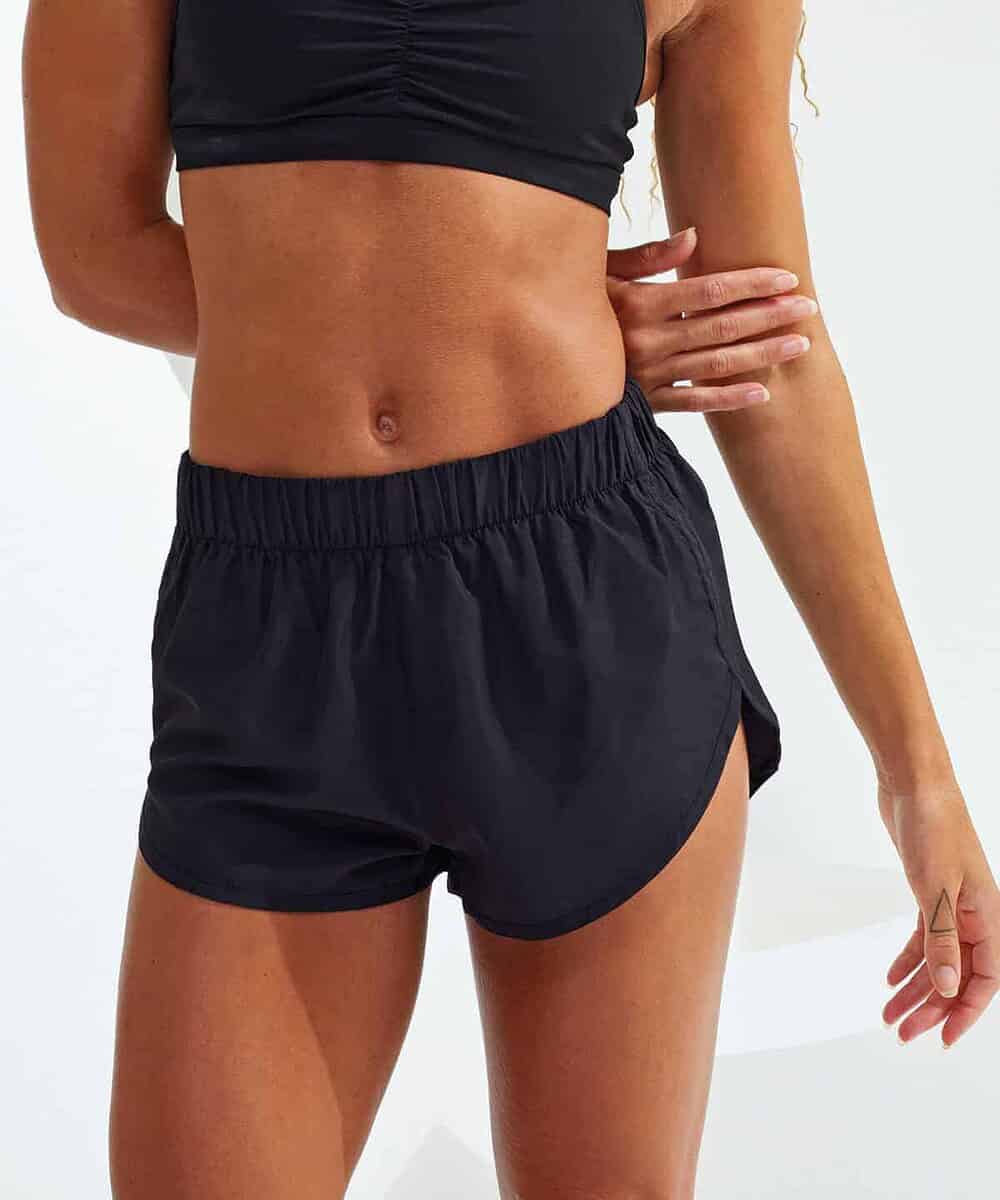 Comfortable black women's running shorts with logo branding.