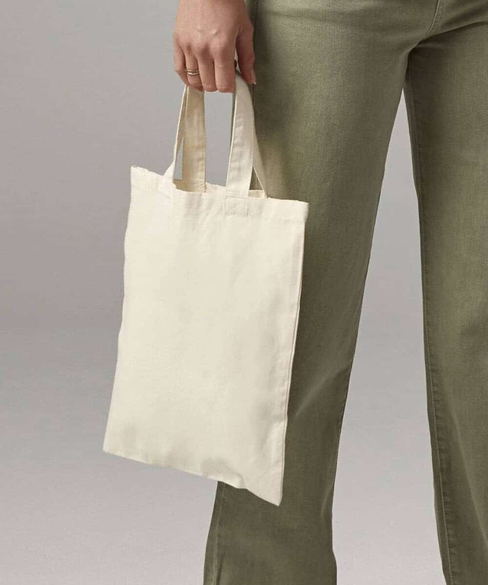 Branded tote bag with handles, perfect for promotional use and eco-friendly shopping. Custom logo pr.