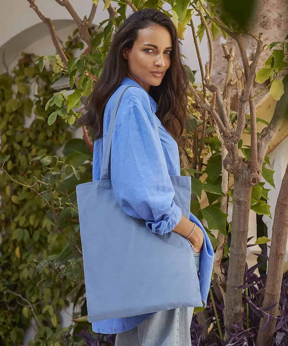 Organic natural dyed reusable tote bag with logo printing options.