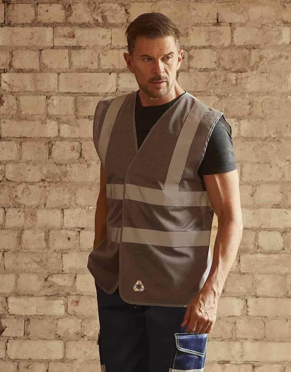 Reflective high-visibility work vest suitable for construction and industrial safety.