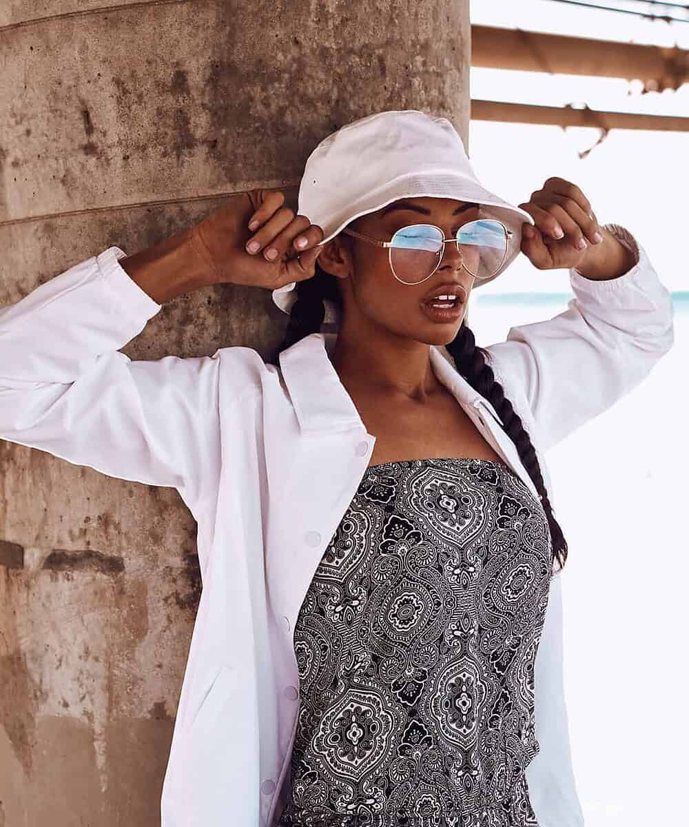 Bucket hat and sunglasses for sun protection and style.
