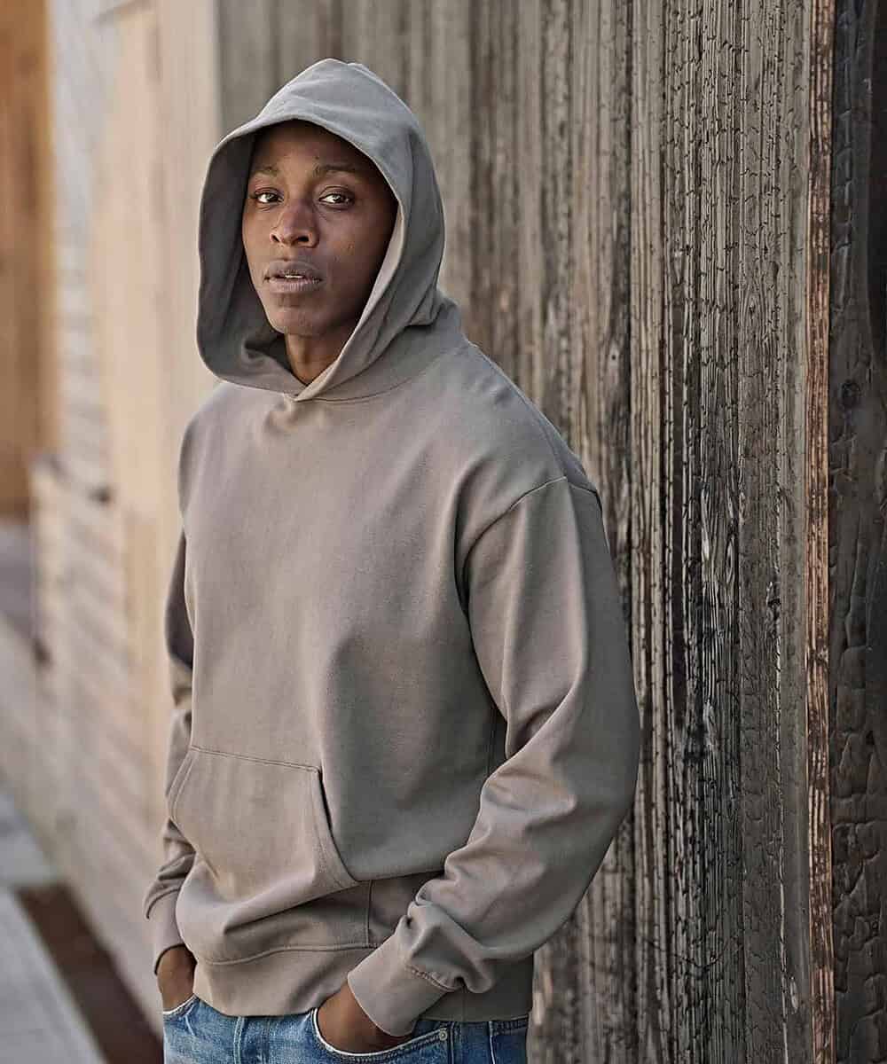 Hooded sweatshirt with a relaxed fit, ideal for everyday workwear and casual staff uniforms.