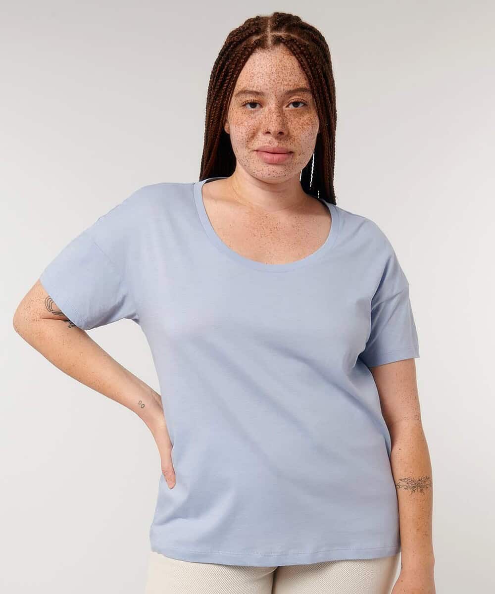 Embroidered women's relaxed fit scoop neck T-shirt in light blue, perfect for casual or team wear.