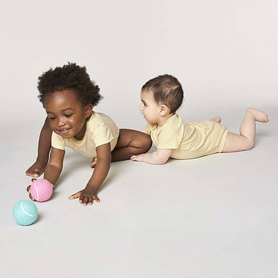 Baby bodysuit with embroidered logo for crew uniforms.